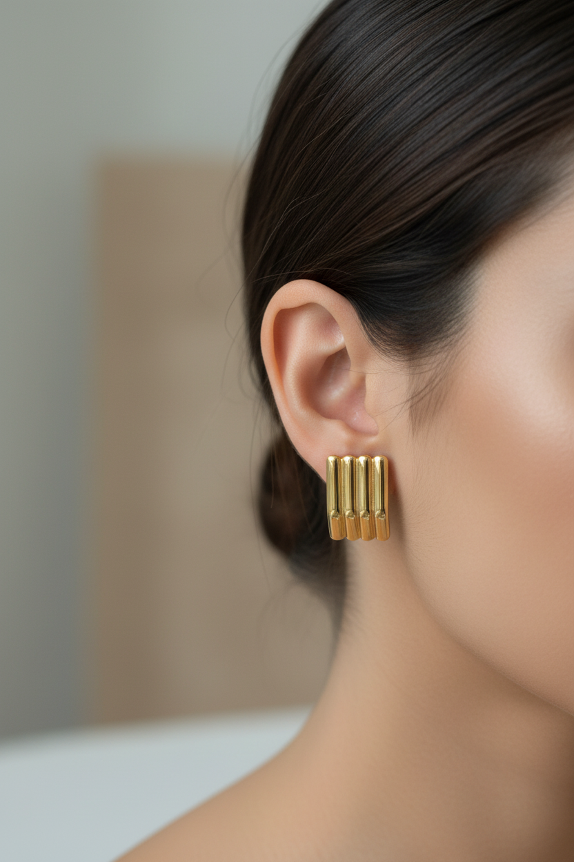 Woman wearing Gold Ribbed Rectangle Stud Earrings